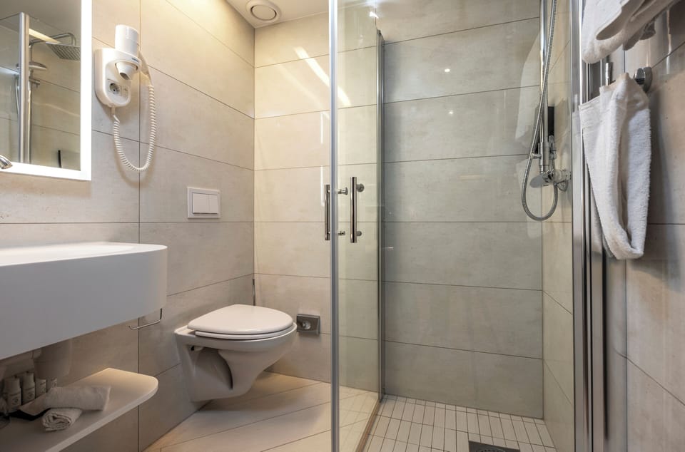 Hair dryer, heated floors, towels, soap