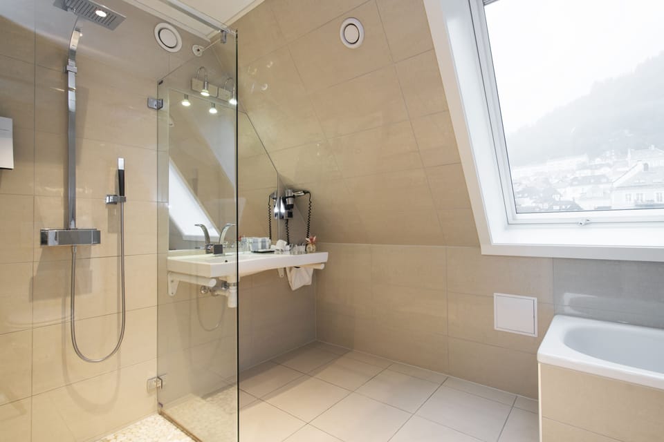 Hair dryer, heated floors, towels, soap