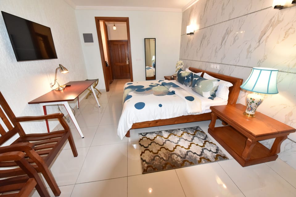 Luxury Room | Desk, laptop workspace, blackout drapes, free WiFi