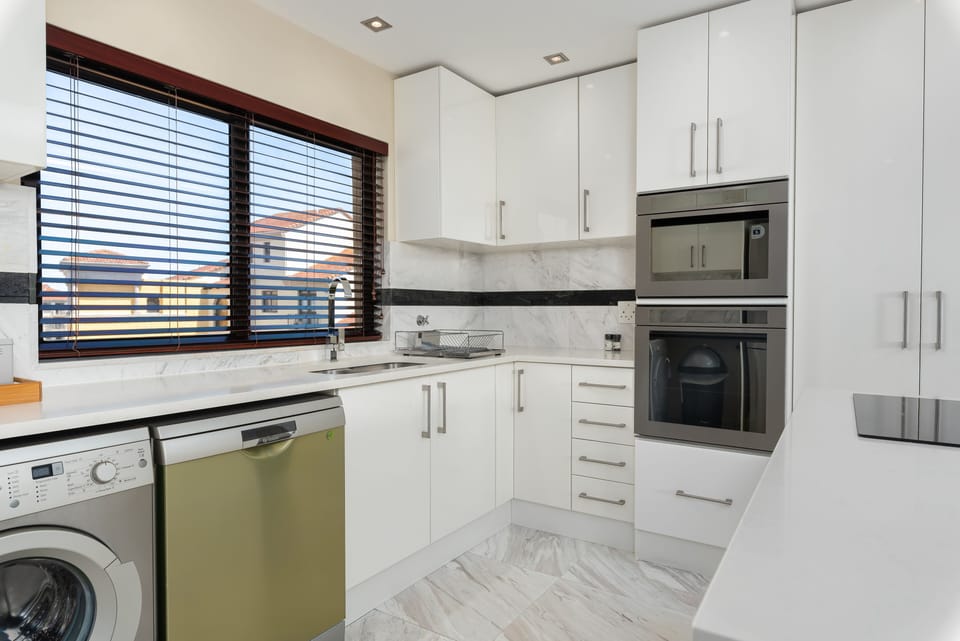 Luxury Apartment | Private kitchen | Fridge, microwave, stovetop, coffee/tea maker
