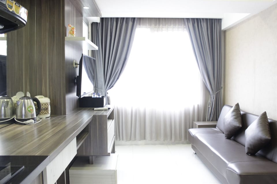 Apartment, Non Smoking, Kitchenette | Living room | TV