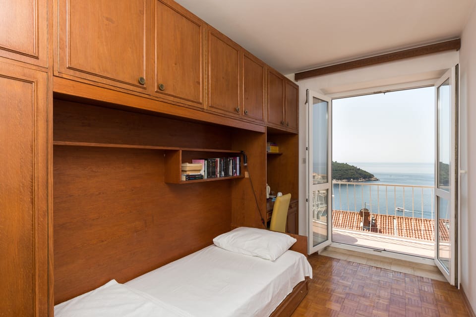 Apartment (1Bedroom Suite,Balcony, Sea view) | 2 bedrooms, free WiFi, bed sheets