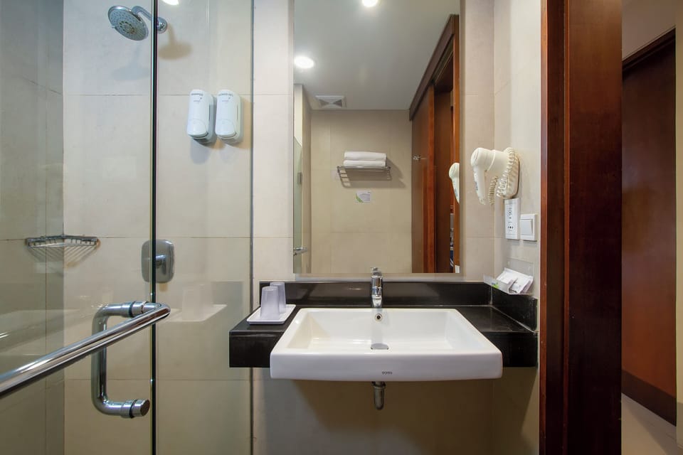 Shower, free toiletries, hair dryer, slippers