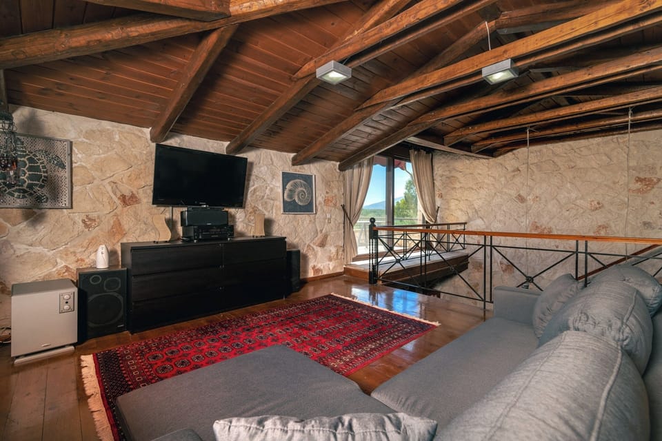 Villa, 4 Bedrooms, Smoking, Private Pool | Living room | Flat-screen TV, fireplace, video-game console