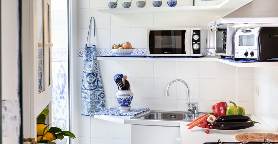 Apartment, 2 Bedrooms, Smoking, Pool Access | Private kitchen | Fridge, stovetop, dishwasher, cookware/dishes/utensils