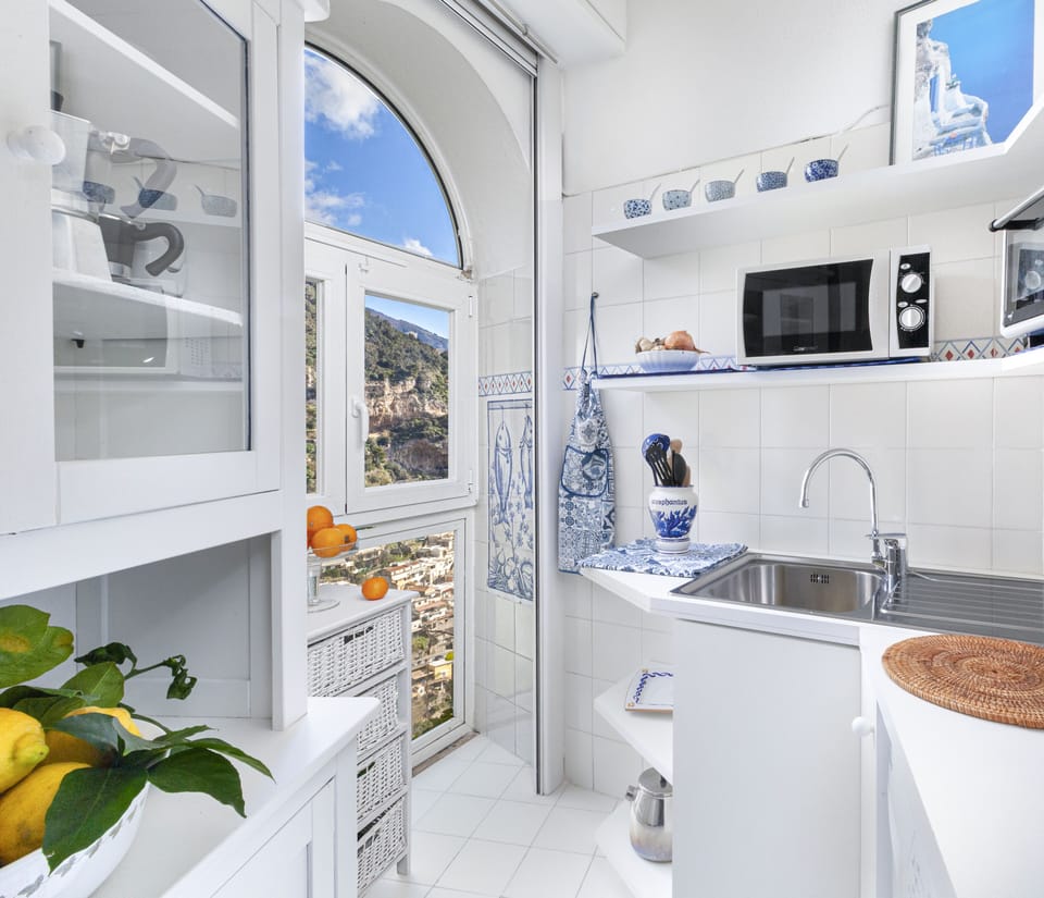 Apartment, 2 Bedrooms, Smoking, Pool Access | Private kitchen | Fridge, stovetop, dishwasher, cookware/dishes/utensils