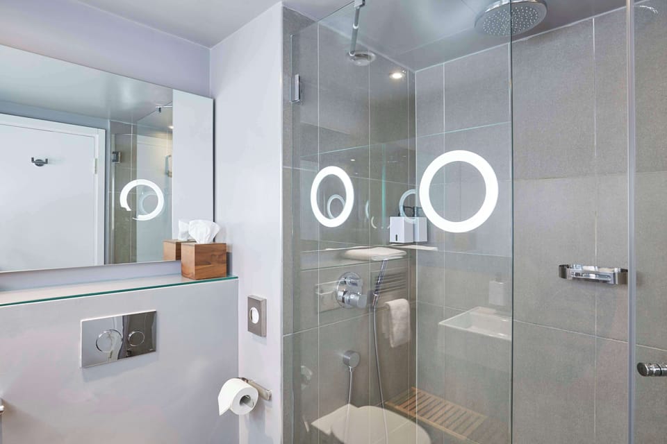 Designer toiletries, hair dryer, towels