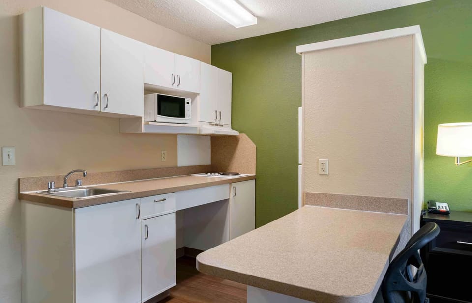 Studio, 1 King Bed, Non Smoking | Private kitchen | Fridge, microwave, stovetop, coffee/tea maker