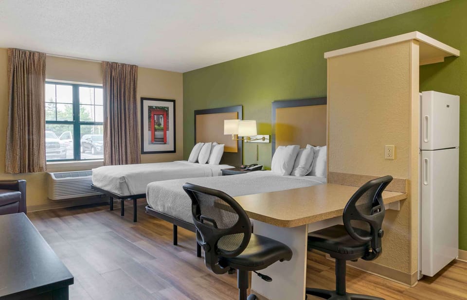 Studio, 2 Double Beds, Non Smoking | Desk, laptop workspace, blackout drapes, iron/ironing board