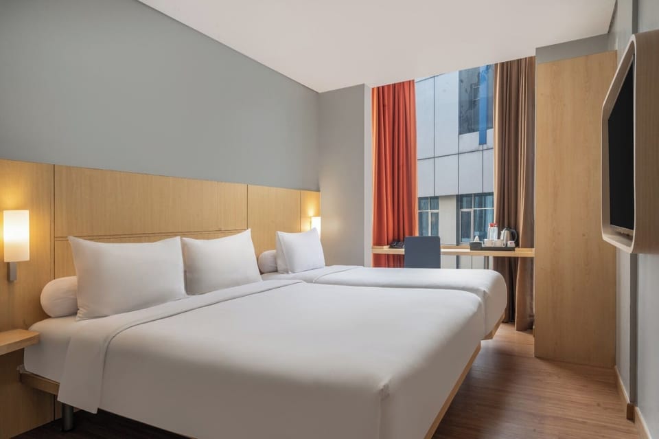 Standard Room, Multiple Beds | In-room safe, desk, laptop workspace, blackout drapes
