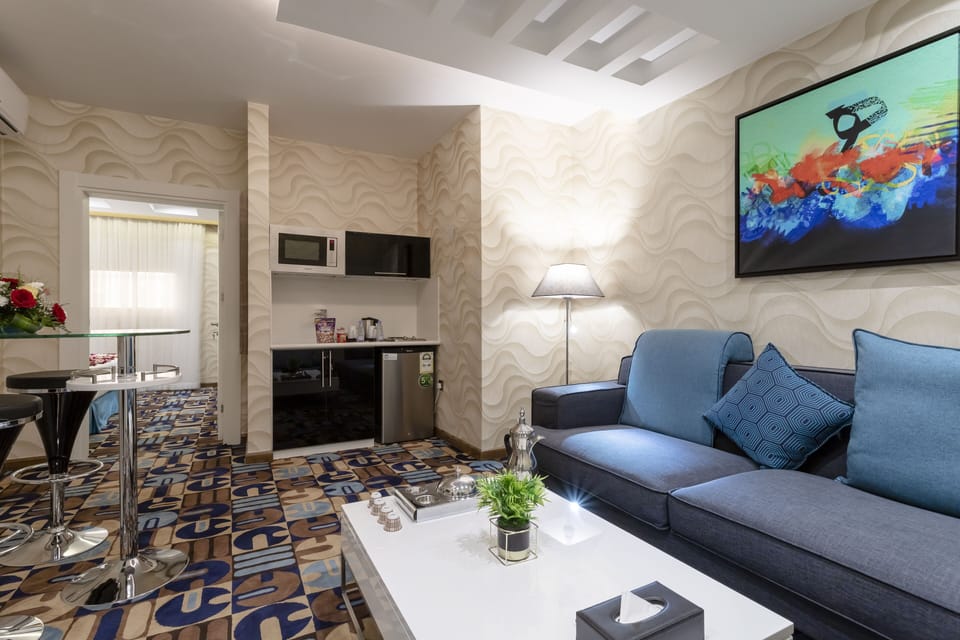 Suite, 1 Bedroom, Connecting Rooms | In-room safe, blackout drapes, iron/ironing board, WiFi (free)