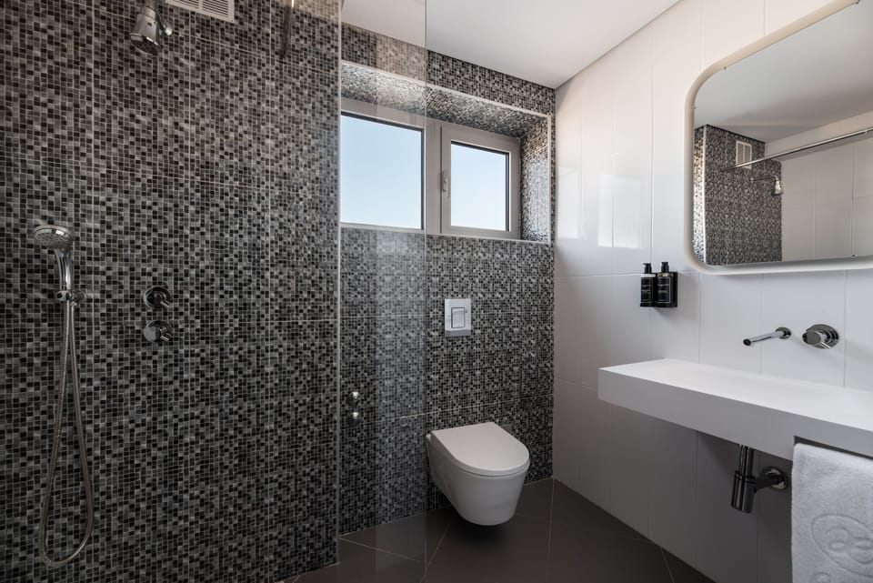 Rainfall showerhead, eco-friendly toiletries, hair dryer, bidet