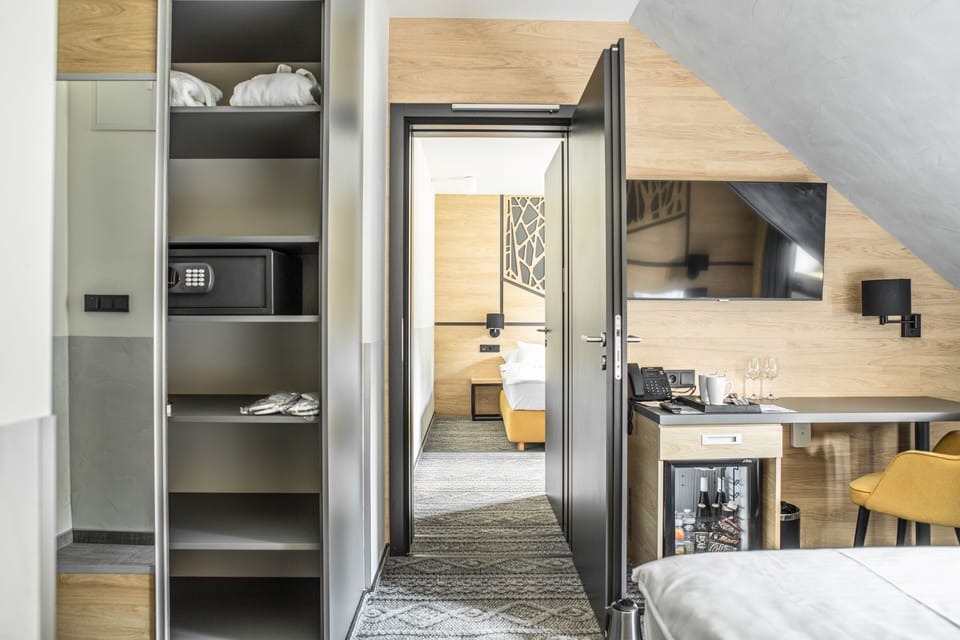 Standard Quadruple Room, 2 Bedrooms | In-room safe, blackout drapes, free WiFi, bed sheets