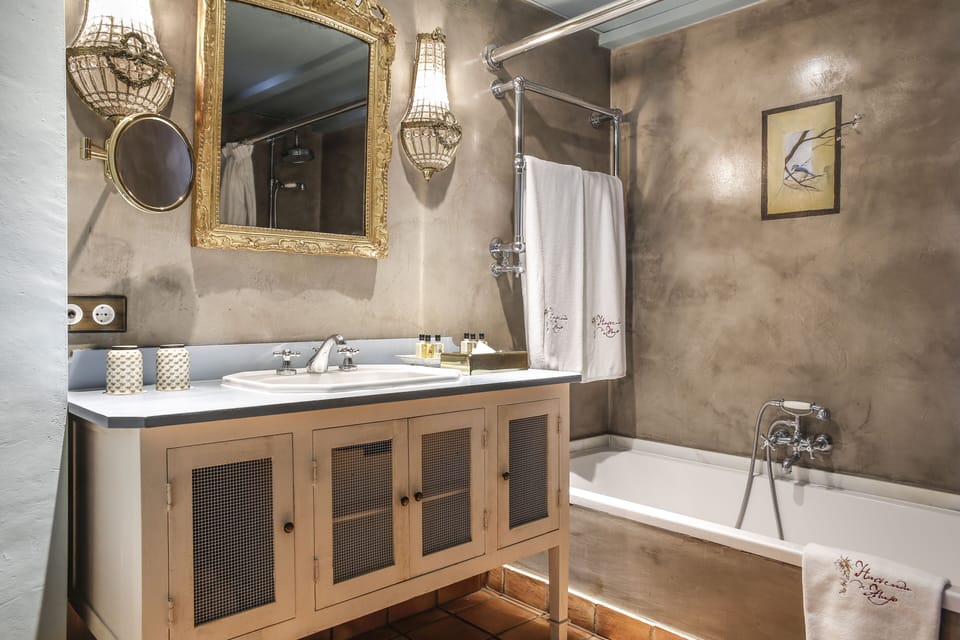Rainfall showerhead, designer toiletries, hair dryer, bathrobes