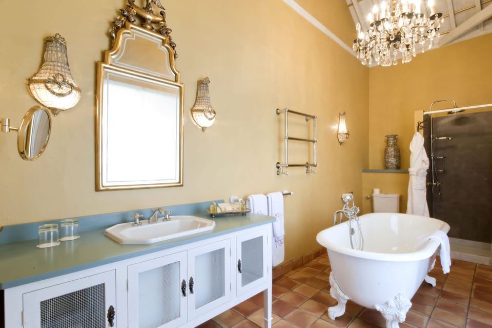 Rainfall showerhead, designer toiletries, hair dryer, bathrobes