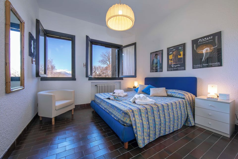 Family Townhome, Multiple Bedrooms, 2 Bathrooms, Mountainside (Residenza La Parusciola Pool and) | 3 bedrooms, iron/ironing board, free WiFi, bed sheets