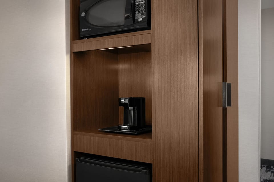 Pillowtop beds, desk, blackout drapes, iron/ironing board