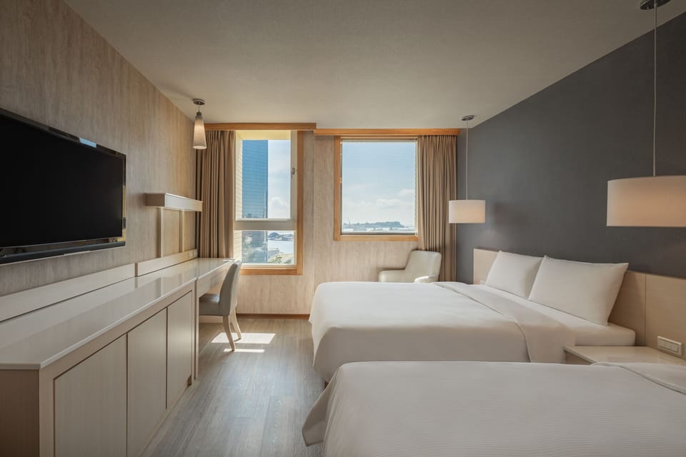 Standard Room, 2 Double Beds, Harbor View | Living area | 42-inch flat-screen TV with cable channels, TV, DVD player