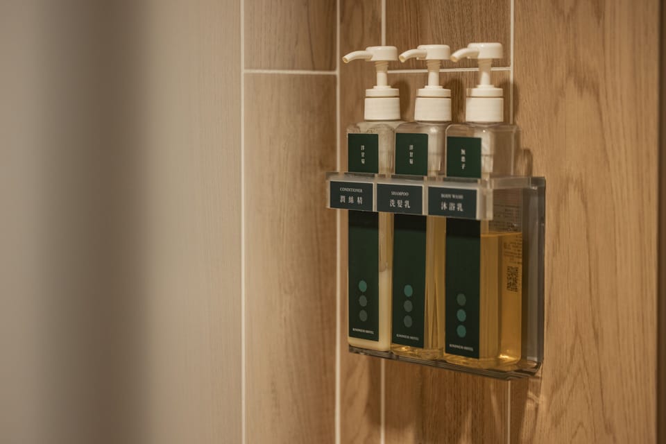 Standard Room, 2 Double Beds | Bathroom | Shower, hydromassage showerhead, hair dryer, slippers
