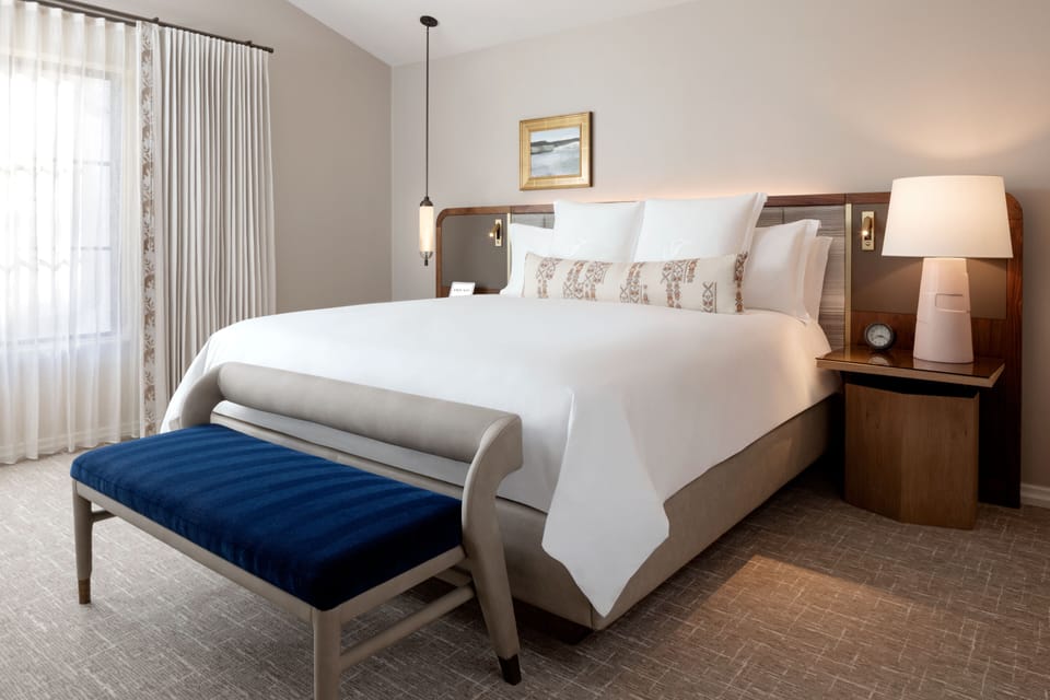 Premium bedding, down comforters, pillowtop beds, minibar