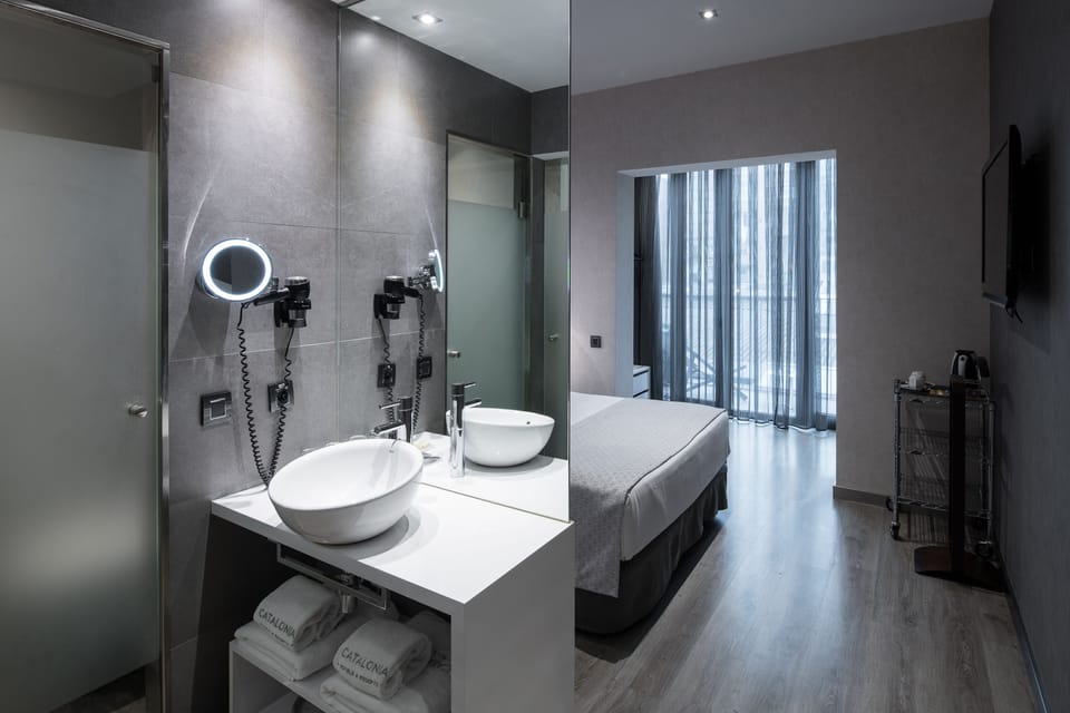 Shower, eco-friendly toiletries, hair dryer, towels