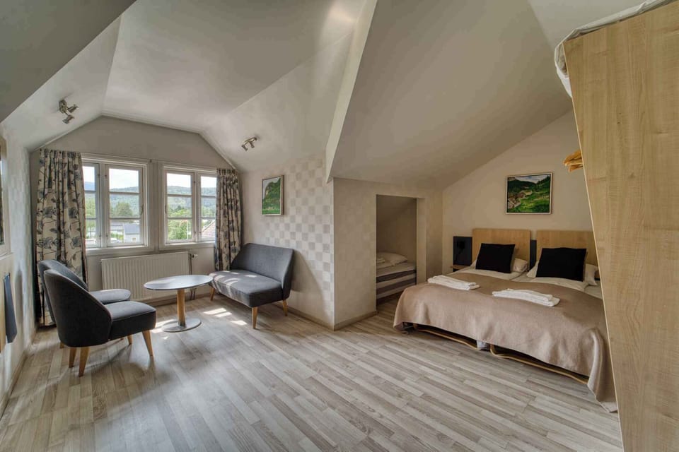 Family Triple Room | Minibar, desk, laptop workspace, soundproofing
