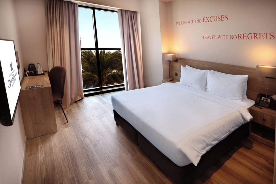 Premium bedding, pillowtop beds, minibar, in-room safe