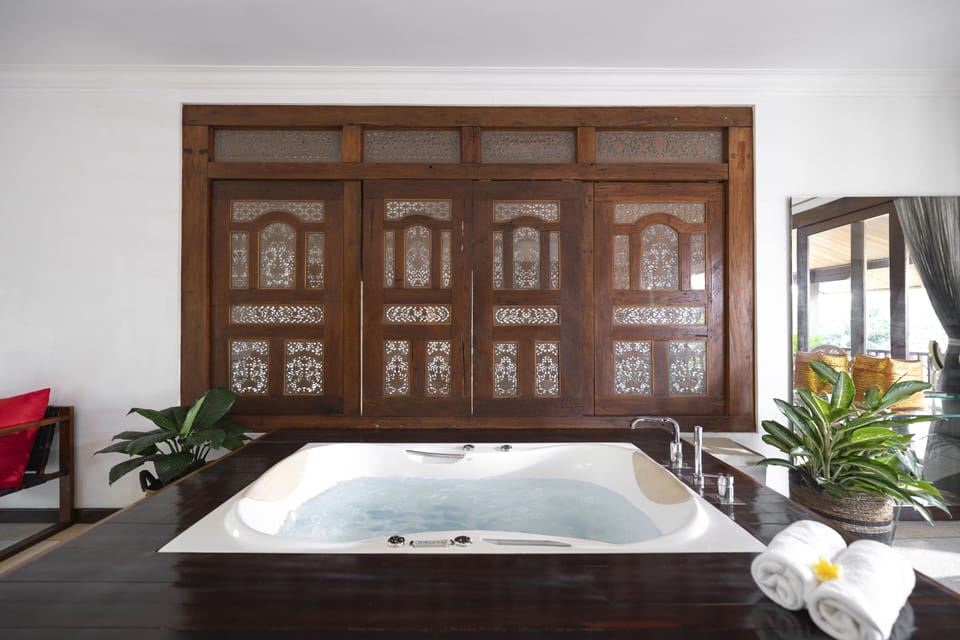 Luxury Villa | Bathroom | Rainfall showerhead, hair dryer, bathrobes, slippers