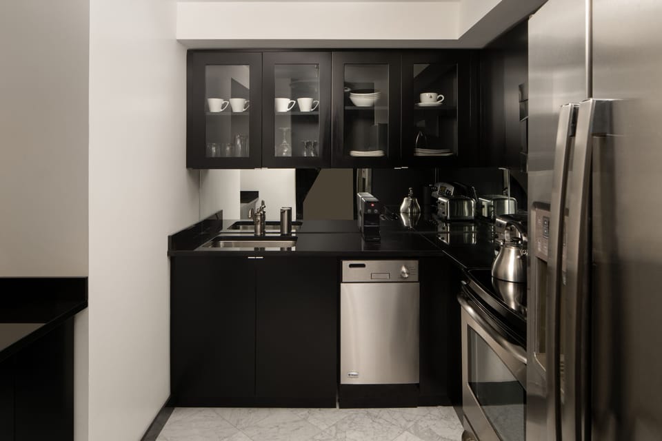 Broadway Skyline Suite | Private kitchen | Fridge, microwave, cookware/dishes/utensils, freezer