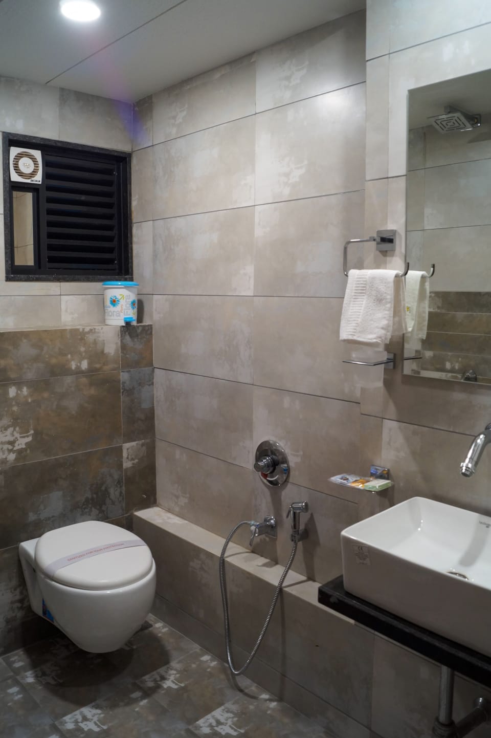 Shower, free toiletries, slippers