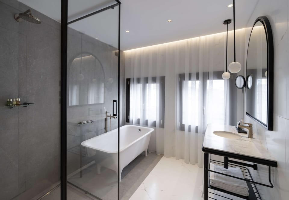 Superior Room, Garden View (Collection) | Bathroom | Rainfall showerhead, eco-friendly toiletries, hair dryer, slippers