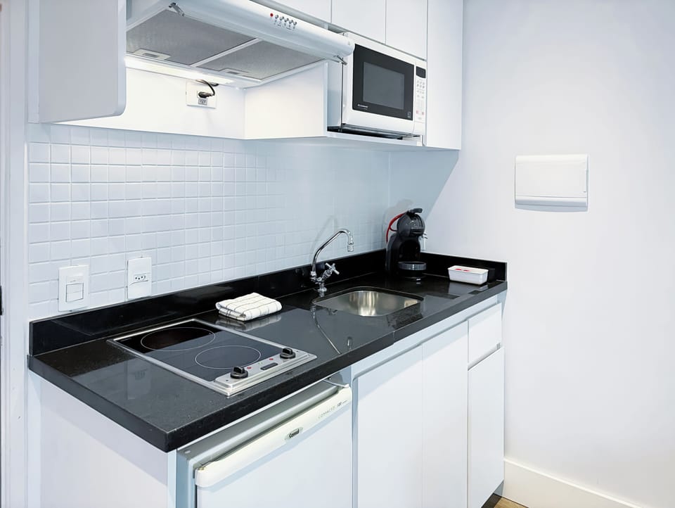 Standard Room, 1 Bedroom | Private kitchen | Fridge, microwave, stovetop, coffee/tea maker