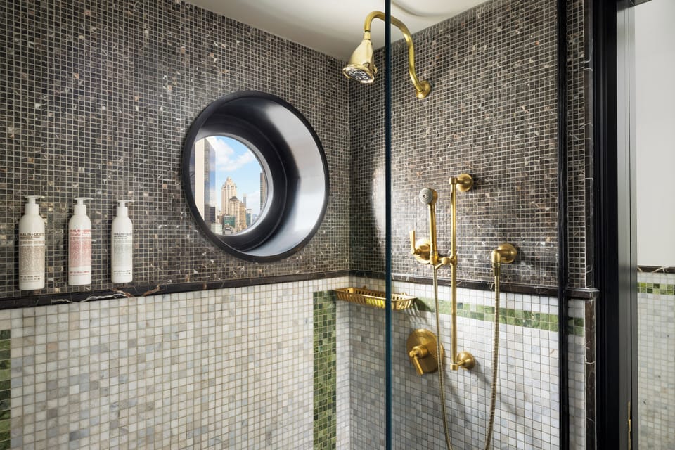Suite, 1 Bedroom | Bathroom | Rainfall showerhead, designer toiletries, hair dryer, bathrobes