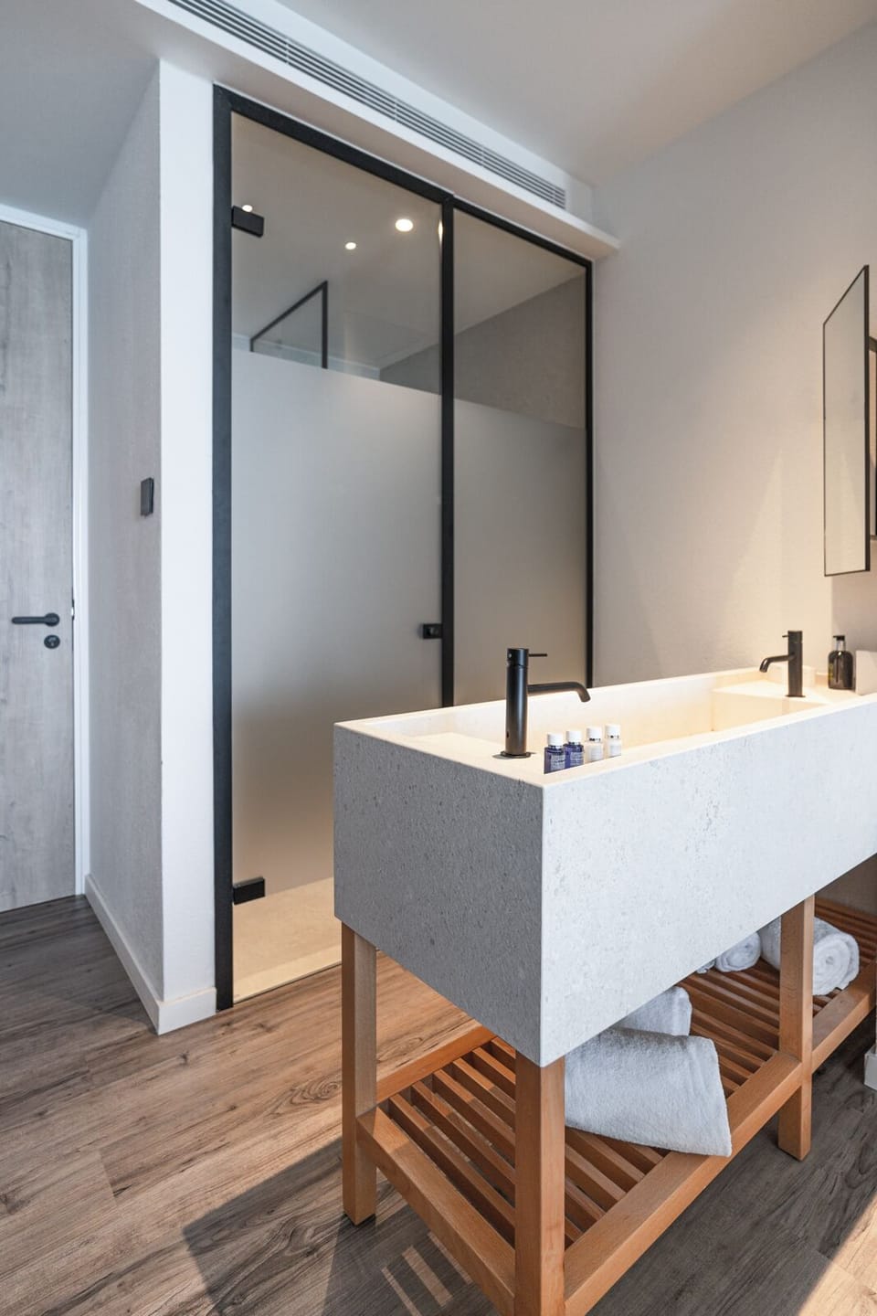 Shower, hair dryer, slippers, towels