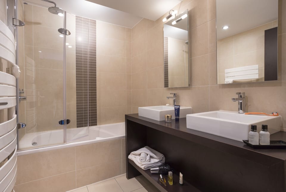 Hair dryer, towels, soap, shampoo