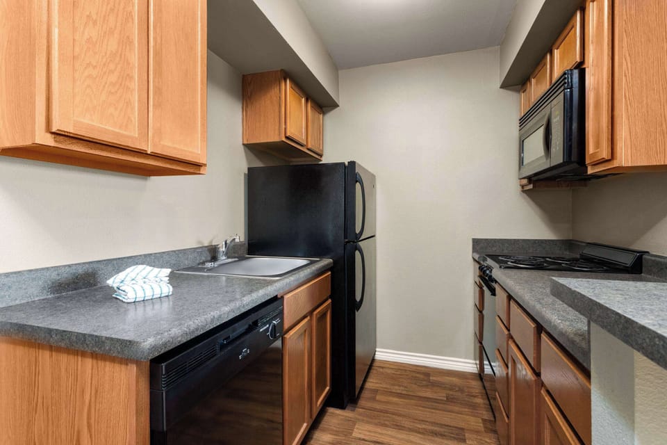 Suite, 1 Bedroom, Non Smoking | 1 bedroom, desk, laptop workspace, iron/ironing board