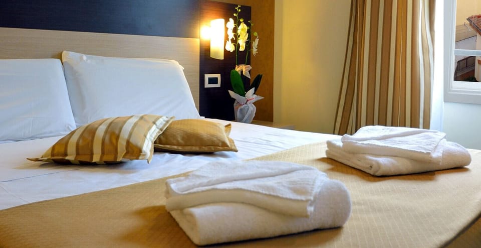 Triple Room | Down comforters, Select Comfort beds, minibar, in-room safe