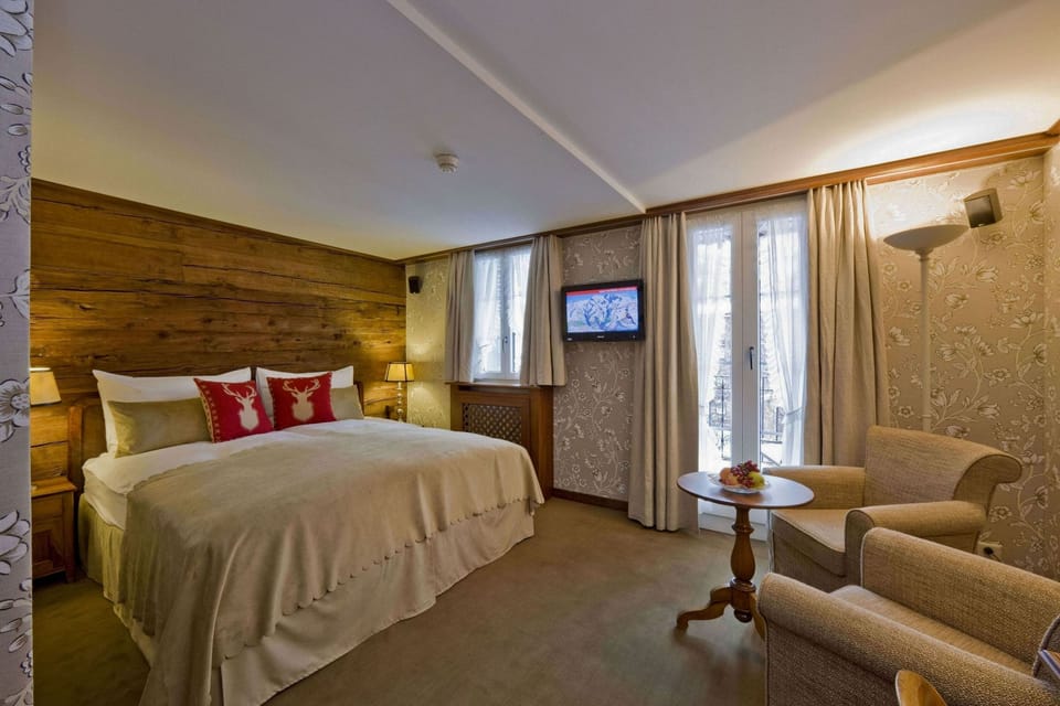 Premium bedding, down comforters, pillowtop beds, free minibar