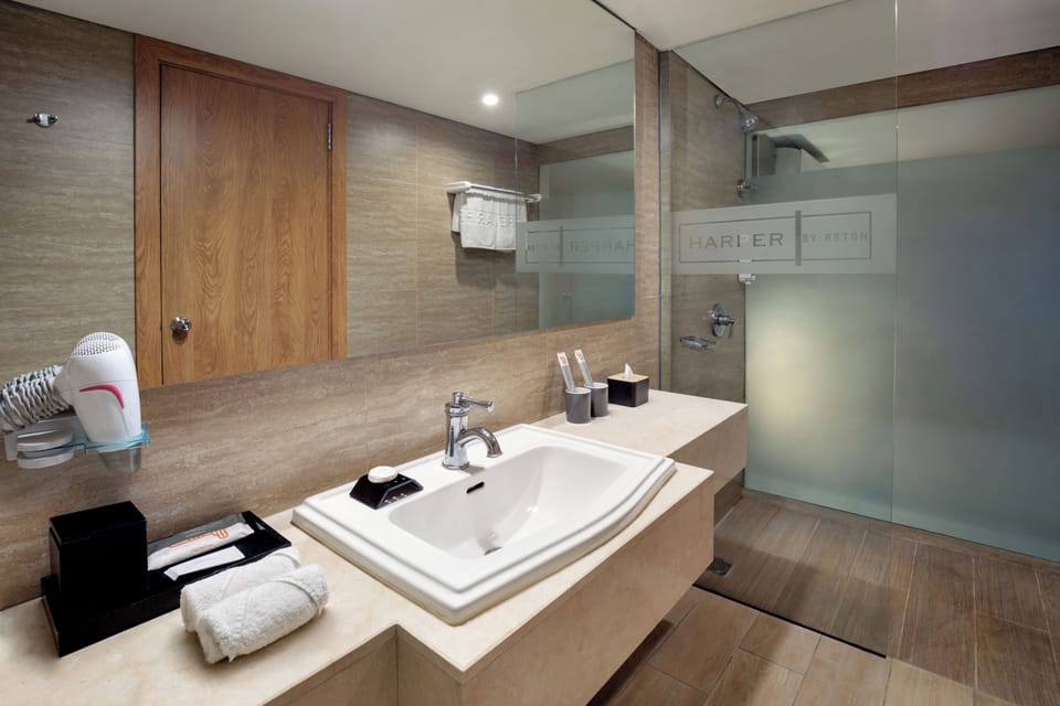 Deluxe Room, Pool Access | Bathroom | Rainfall showerhead, free toiletries, hair dryer, slippers