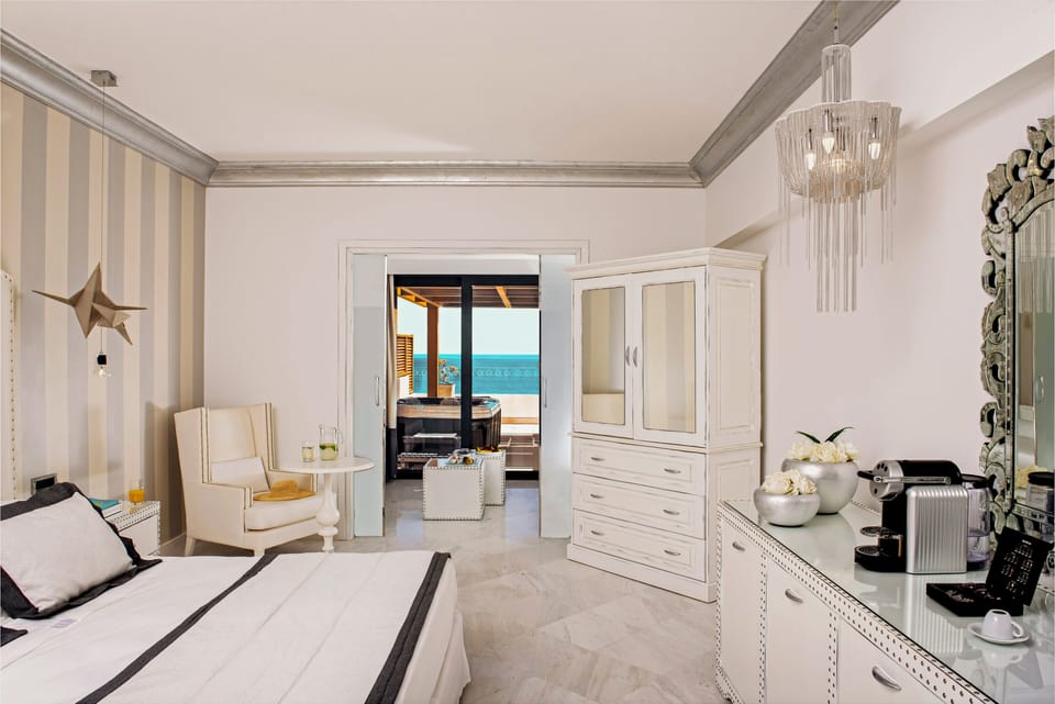Family Suite, Sea View (Whirlpool Spa) | Minibar, in-room safe, soundproofing, iron/ironing board