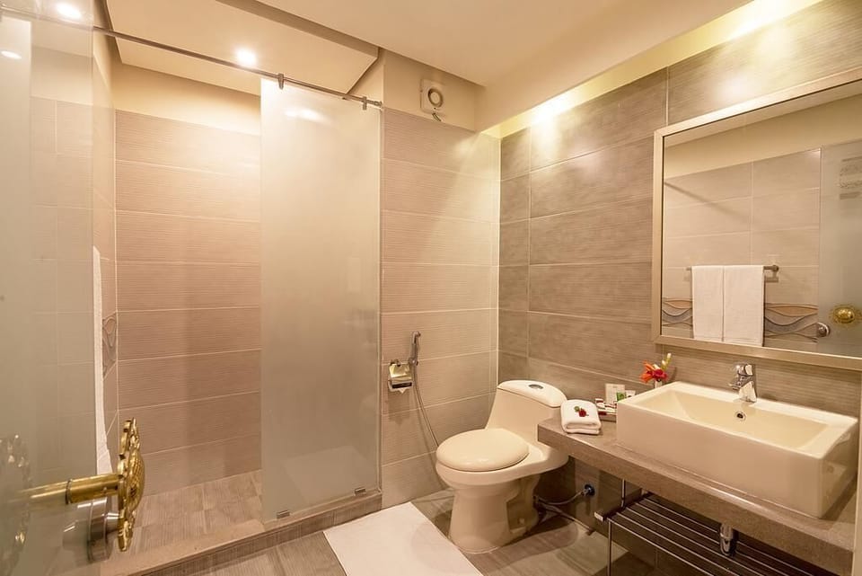 Shower, free toiletries, hair dryer, bathrobes