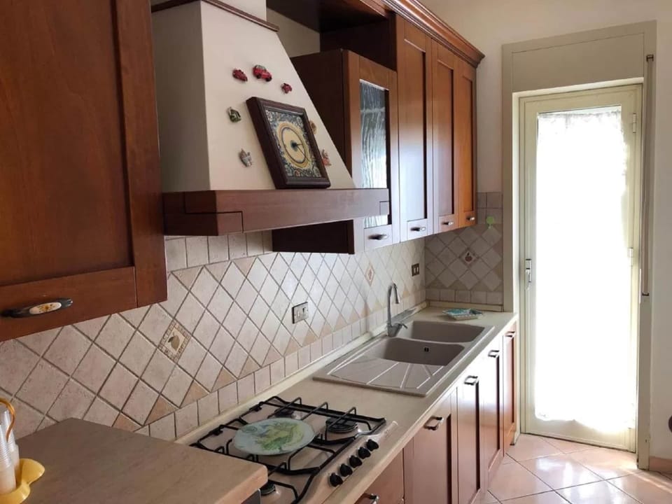 Apartment | Private kitchen | Stovetop, dishwasher, cookware/dishes/utensils