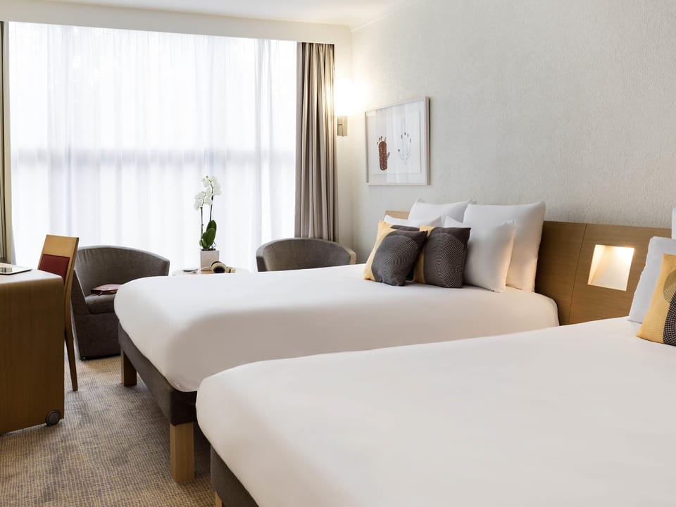 Family Room, 2 Double Beds | Down comforters, minibar, in-room safe, desk