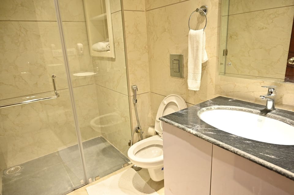 Shower, rainfall showerhead, soap, shampoo
