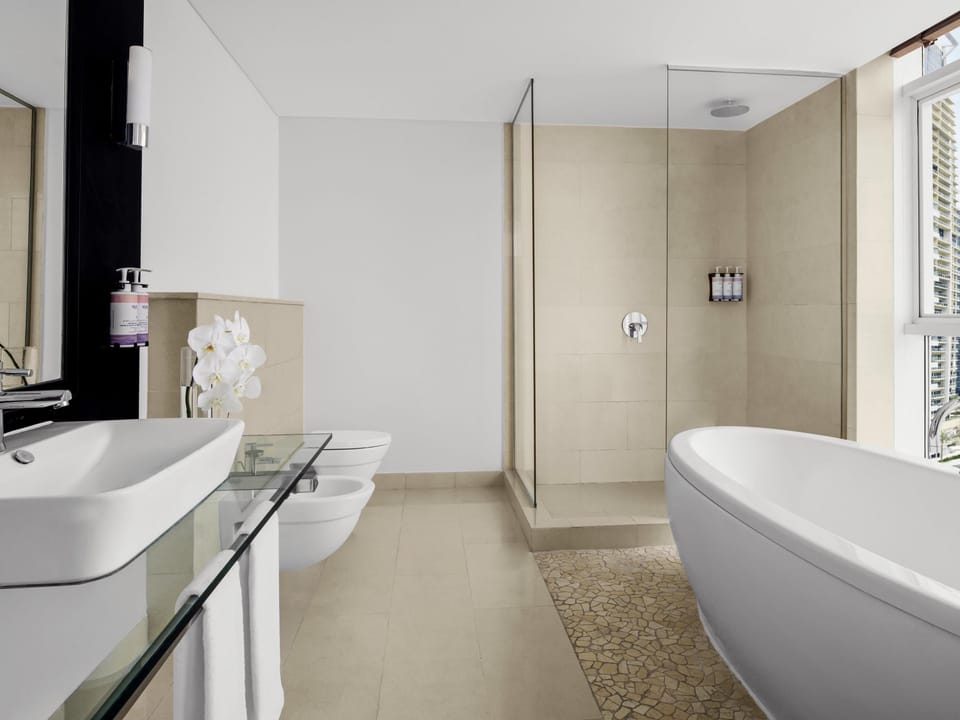 Premium Suite, 1 King Bed (Free Beach Access) | Bathroom | Combined shower/tub, deep soaking tub, rainfall showerhead