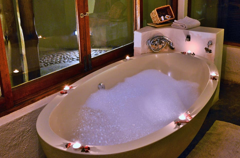 Luxury Suite, 1 King Bed, Hot Tub | Deep soaking bathtub