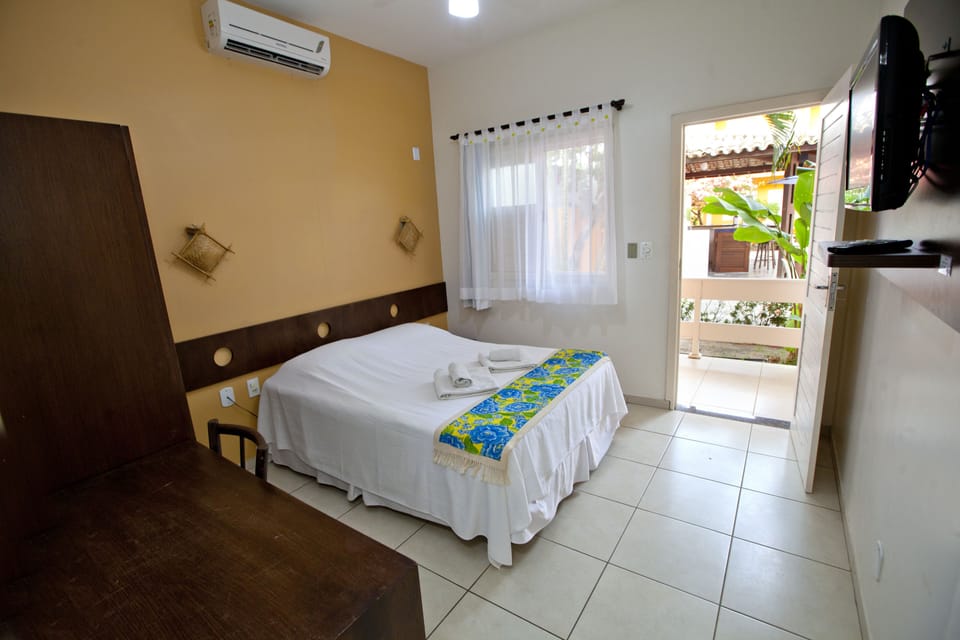 Standard Room | Minibar, in-room safe, individually decorated, desk