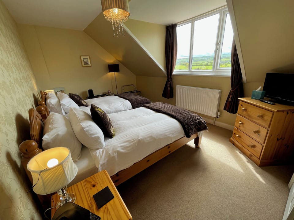 Twin Room, Private Bathroom (Second Floor Twin) | Free WiFi, bed sheets