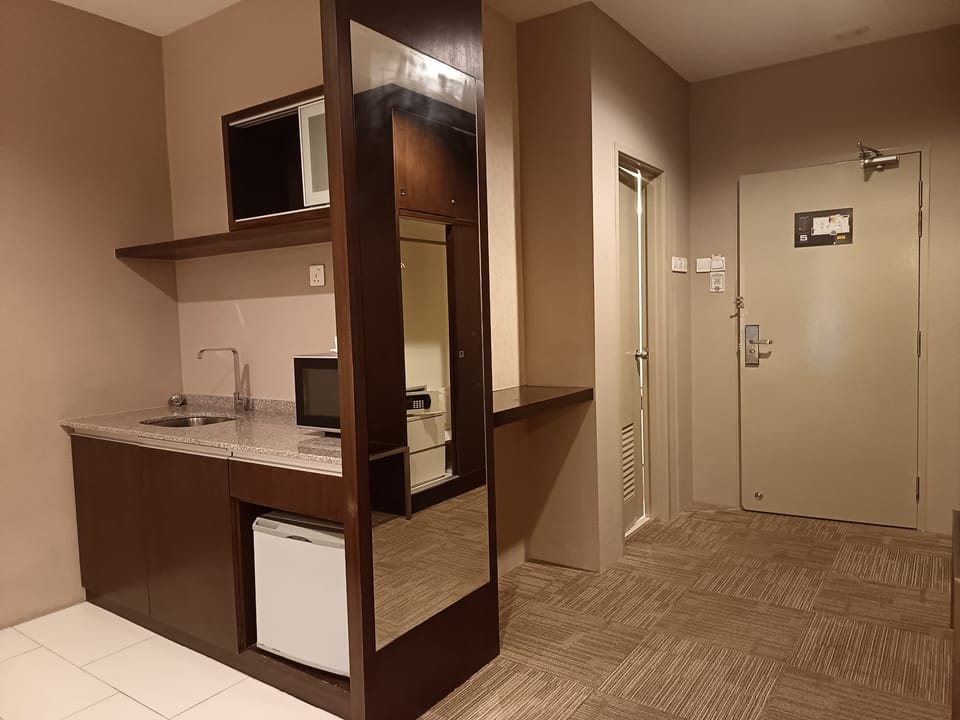 Deluxe Triplet | Private kitchenette | Microwave, electric kettle