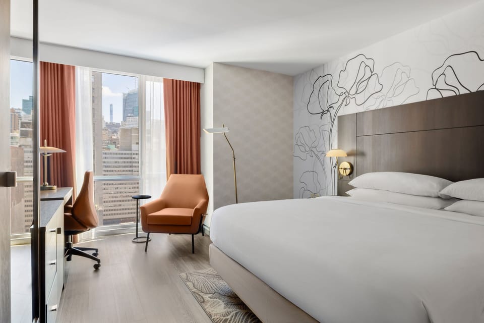 Premium bedding, down comforters, in-room safe, desk